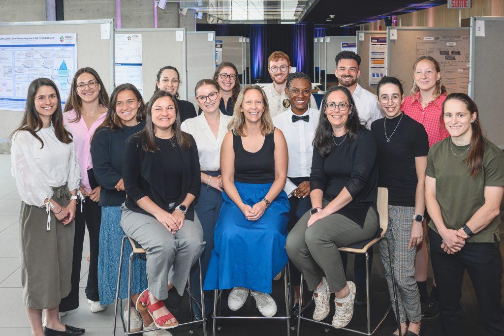 A group of participants and contributors pose for a group photo during the 1st International Congress on Safe Sport Research in Québec City.